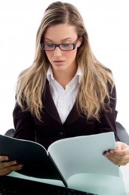 Female-reading-document---Free-Digital-Photos---Imagery-Majestic.jpg