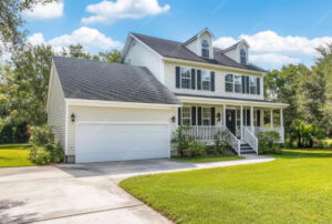 Rural Indiana homestead with farmhouse, garden, and open farmland